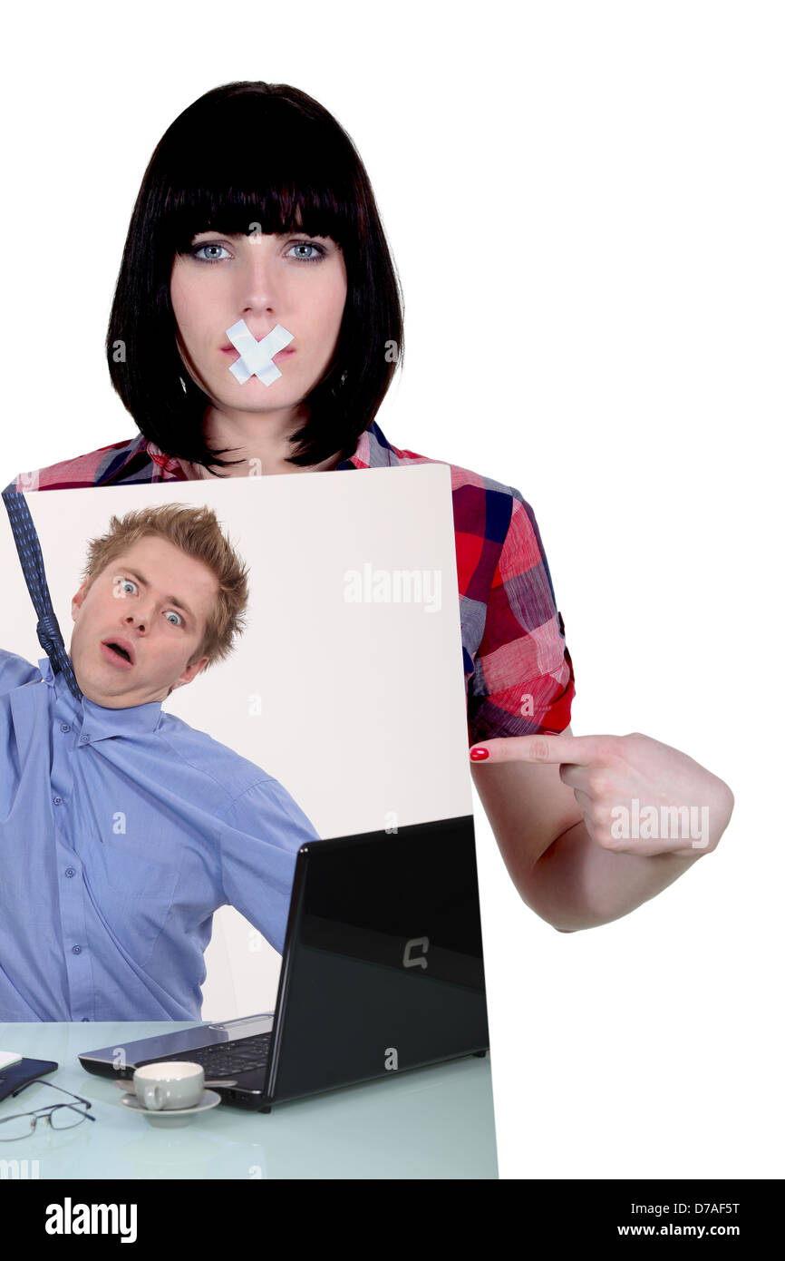 Woman showing picture of man hanging with necktie Stock Photo