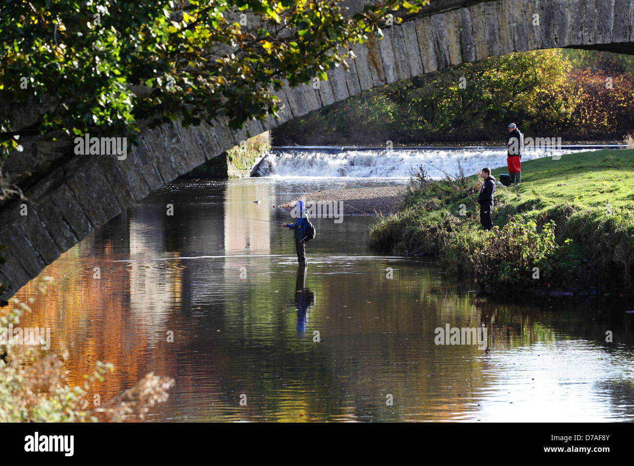 People fishing in the White Cart Water in Pollok Country Park, Glasgow, Scotland, UK Stock Photo