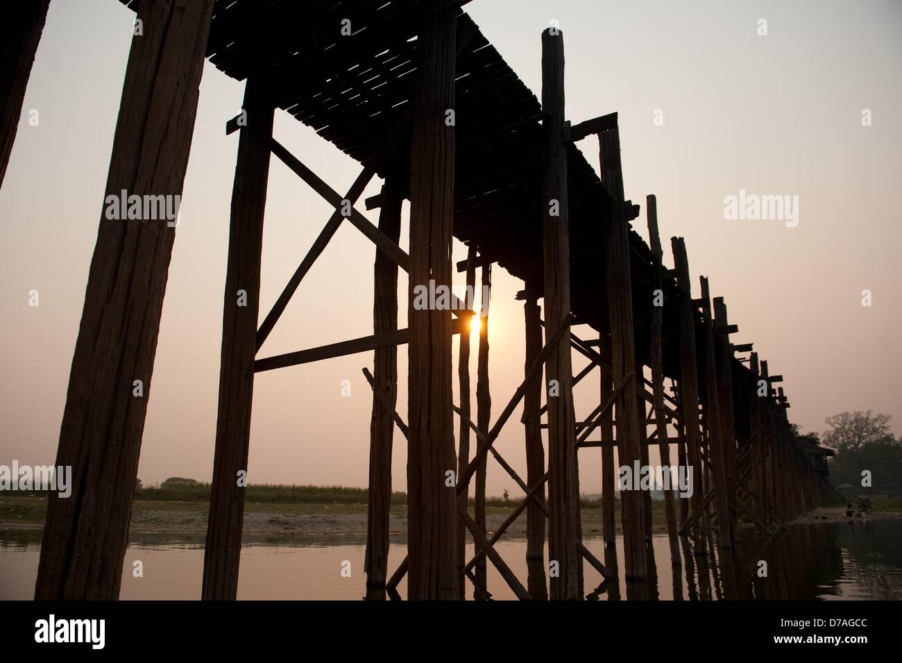 The U Bein Bridge spans across the Taungthaman Lake in Amarapura ...