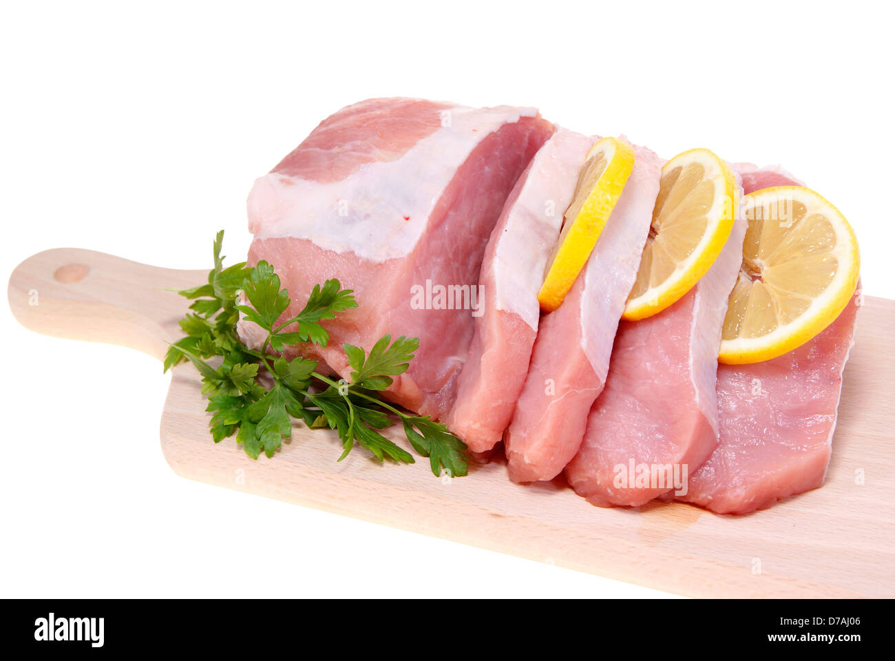 part of pork loin on desk-board isolated on whie background Stock Photo