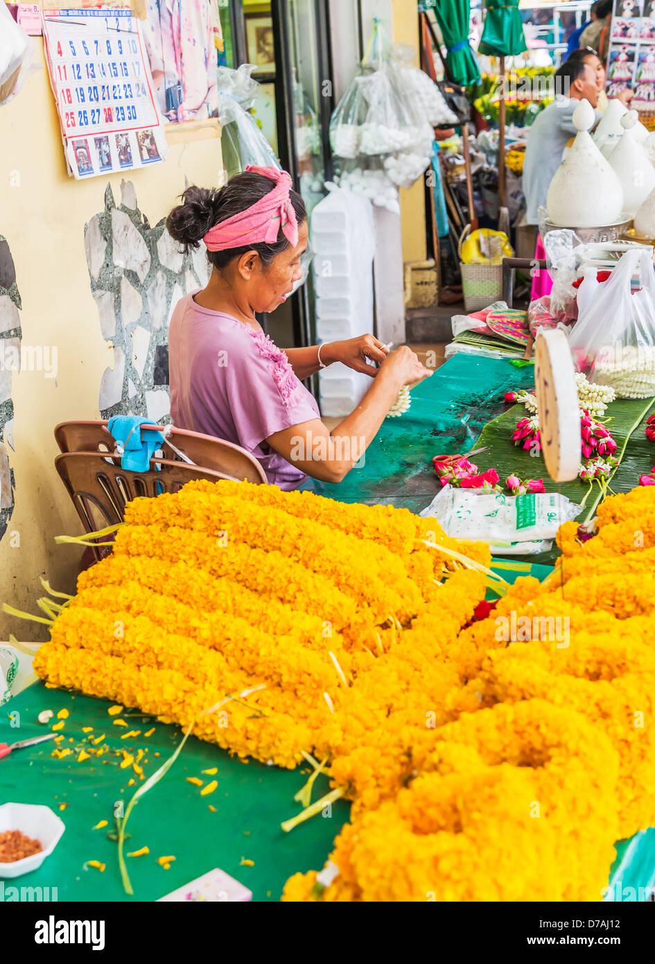 Bangkok Flower Market, Bangkok, Thailand stall selling marigold garlands Stock Photo Alamy