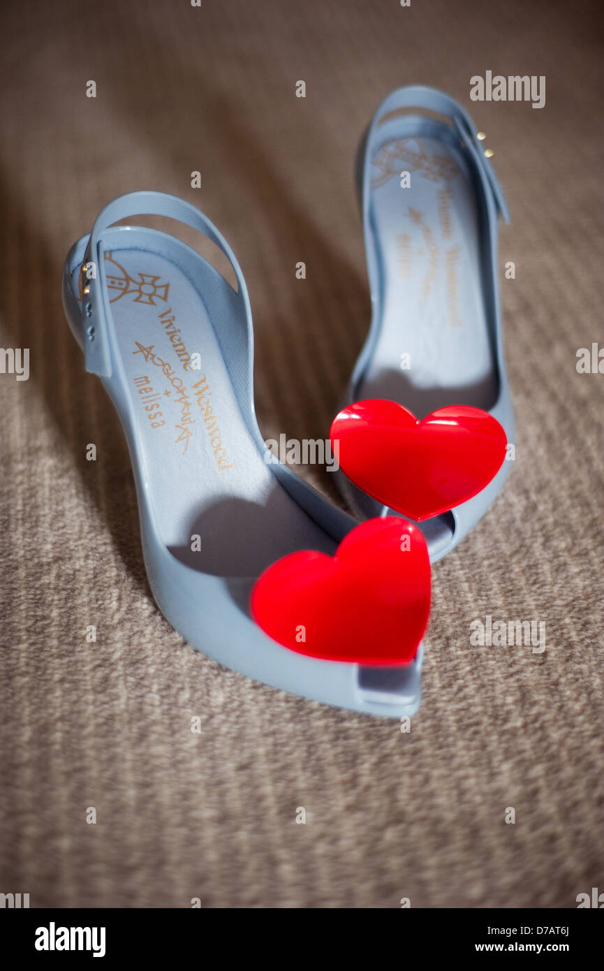 Vivienne Westwood shoes on a carpeted hotel floor Stock Photo - Alamy