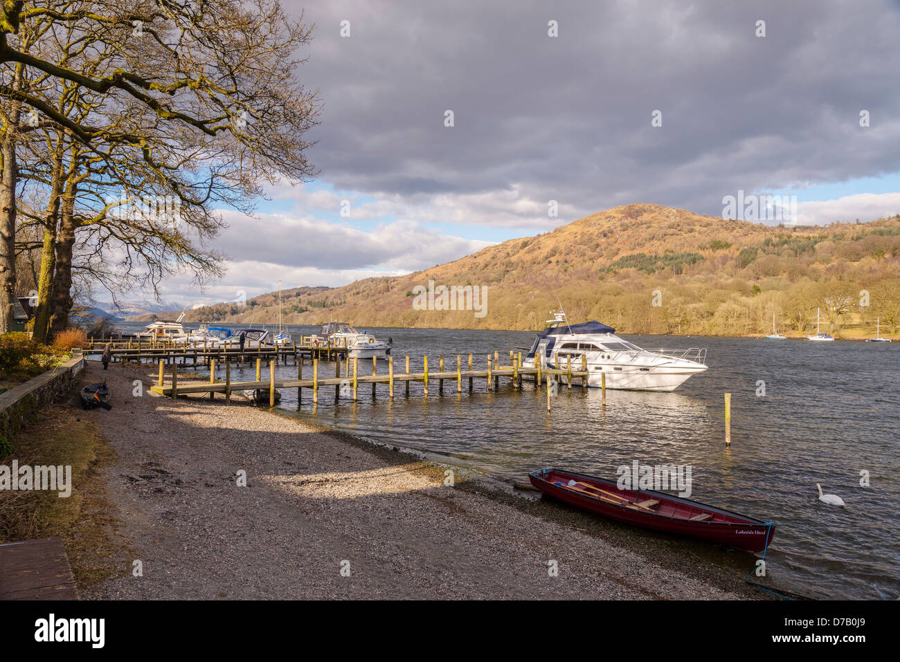 Evening sunshine on the jetties at Lakeside on Lake Windermere with ...