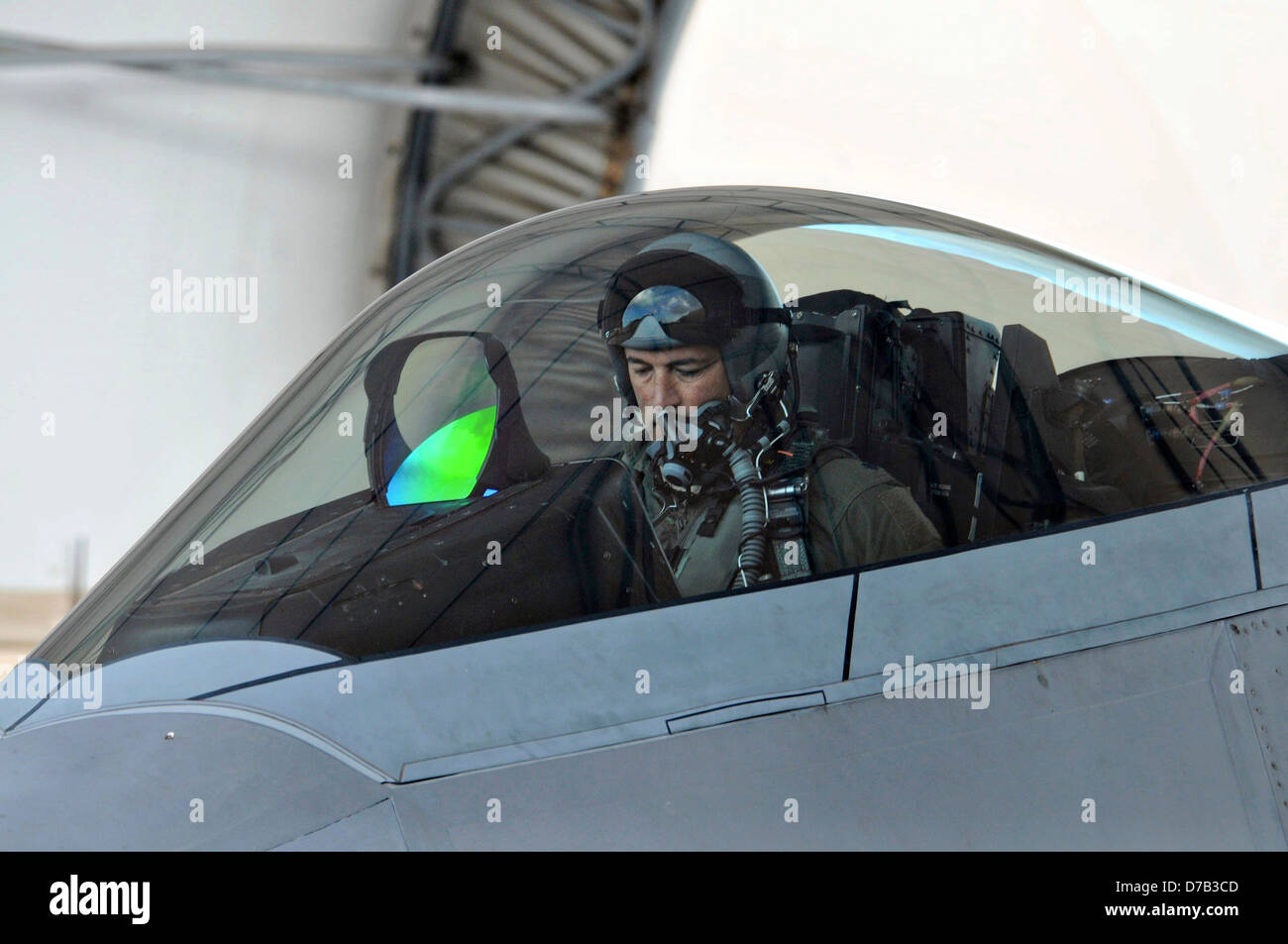 A US Air Force F-22 Raptor stealth fighter aircraft prepares to taxi April 6, 2013 at Joint Base Pearl Harbor-Hickam, Hawaii. Stock Photo