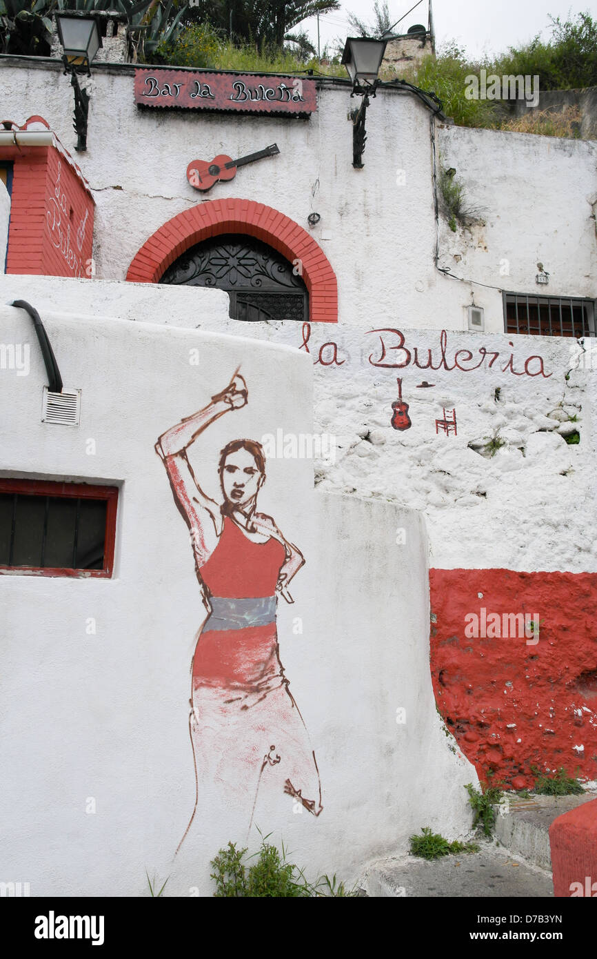 Cave houses of the Sacramento district of Granada - flamenco bar Stock Photo