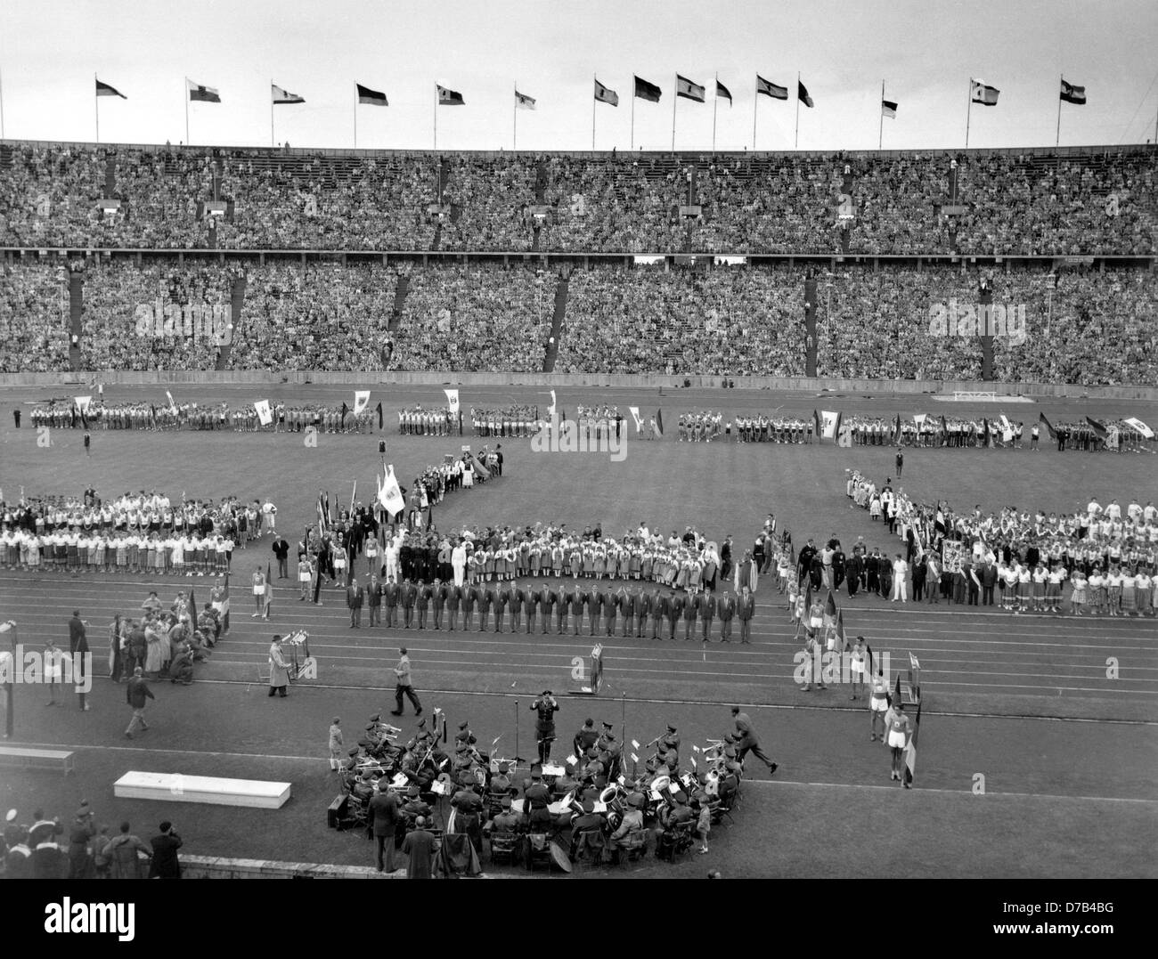 The German soccer team assembles in the sold out Olympic Stadium in