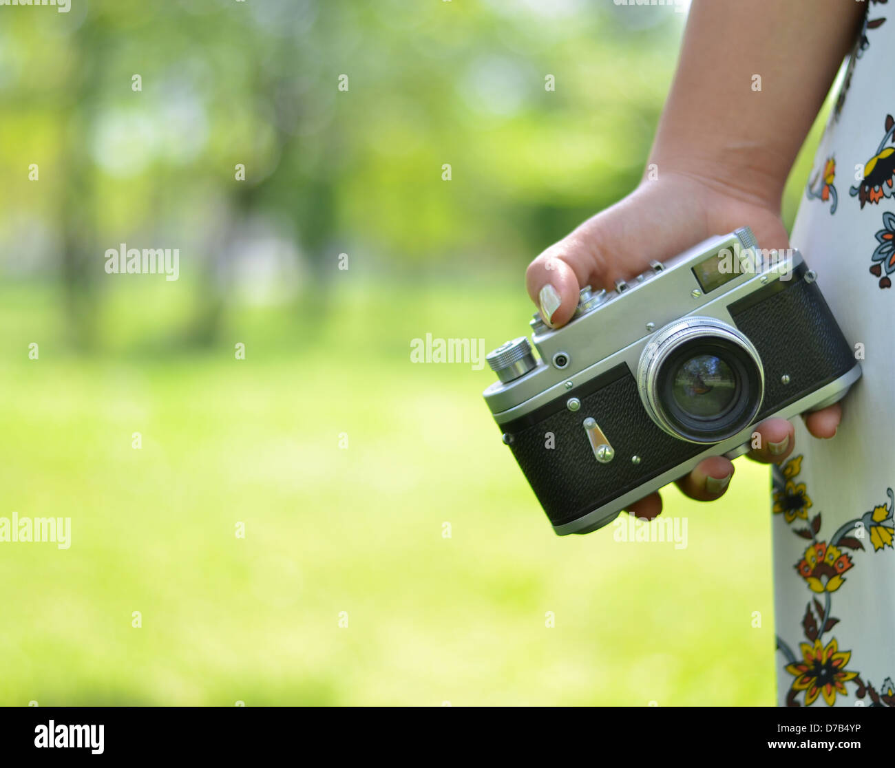 Hand holding vintage camera close hi-res stock photography and images ...