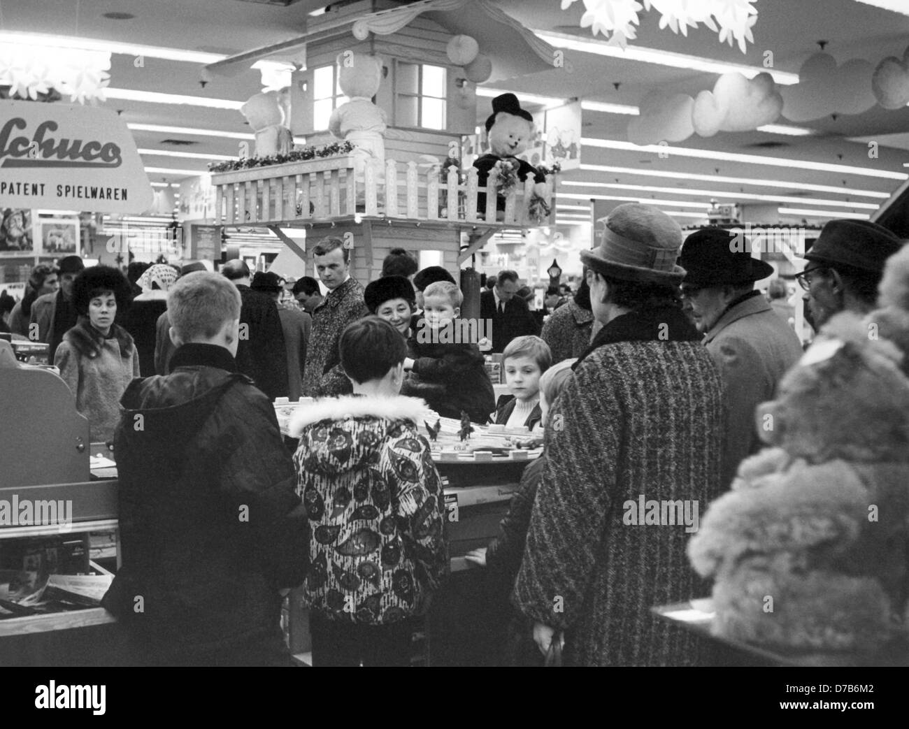 Children and customers crowd in the toy department of a shopping house in Nuremberg in the pre-Christmas time in 1966. Stock Photo