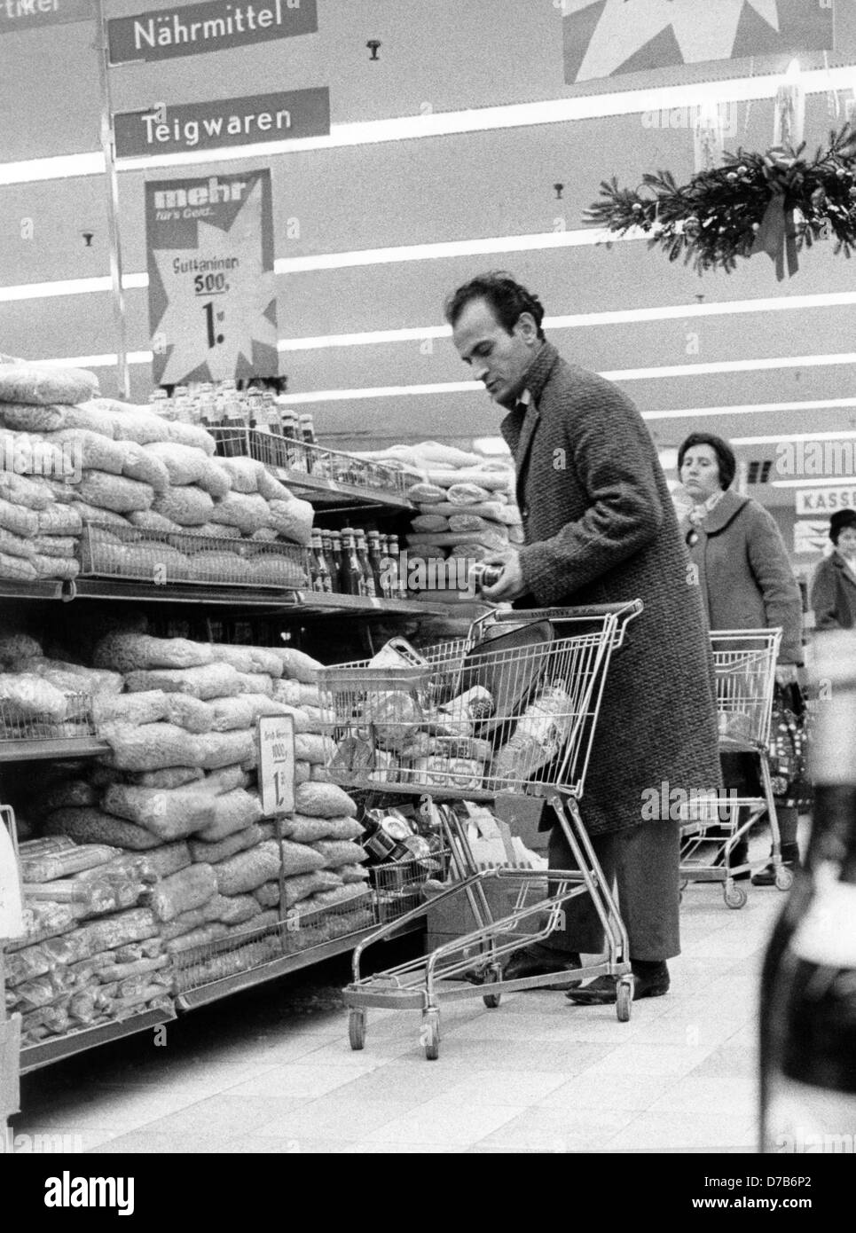 Customers in a self-service store in Germany in the 1960th. Stock Photo