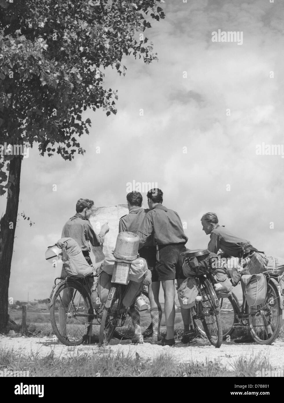 Four boy scouts study a map in the 1950s Stock Photo - Alamy