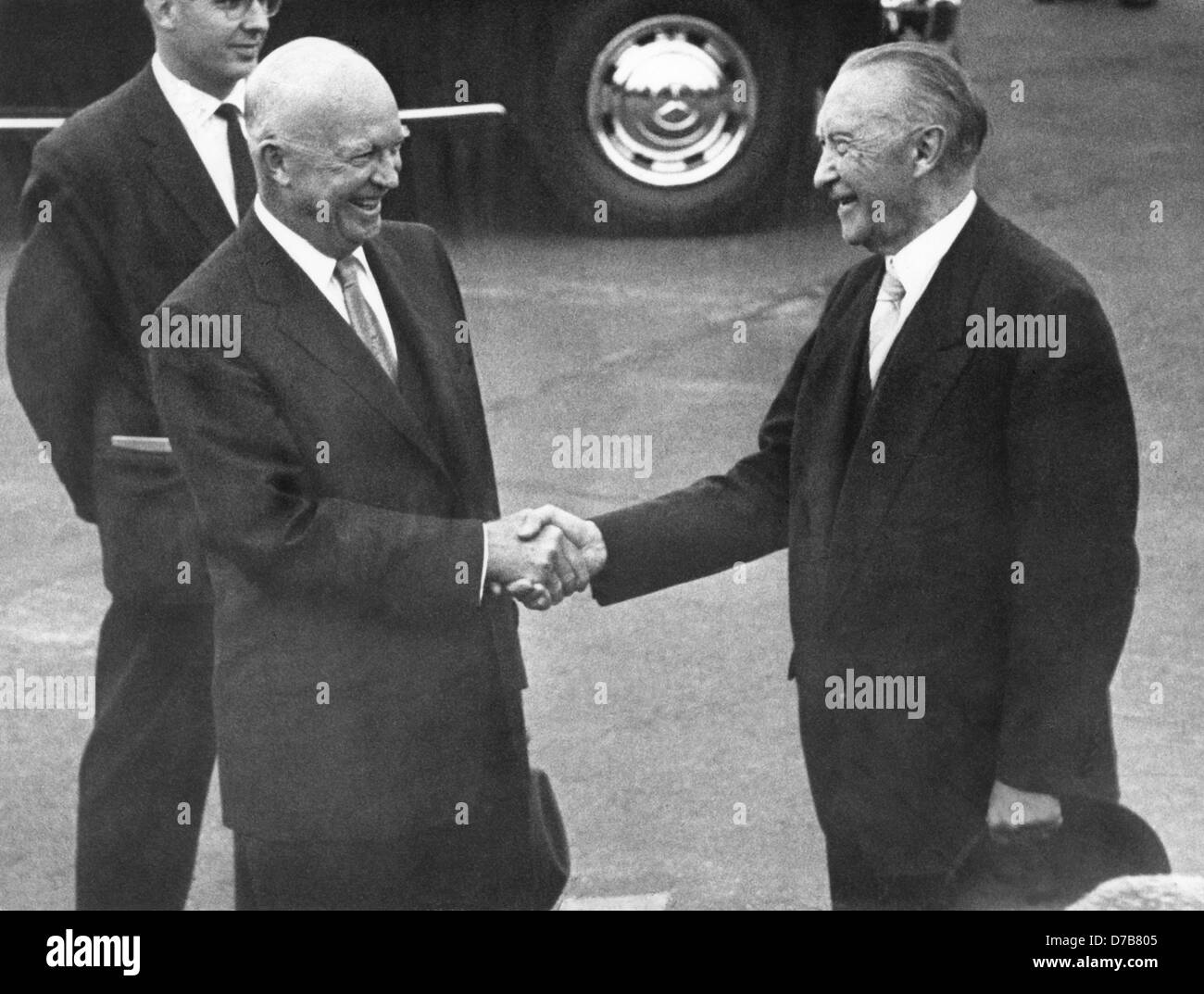 American president Dwight D. Eisenhower (l) is welcomed by German chancellor Konrad Adenauer after his arrival in Bonn on the 26th of August in 1959. Eisenhower arrived for a one-day visit to the Federal Republic of Germany. Stock Photo