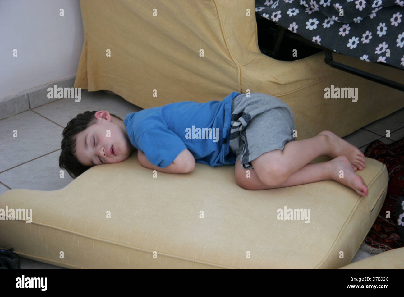 child asleep on floor Stock Photo Alamy