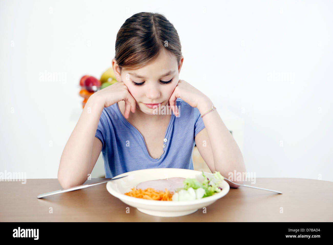 CHILD EATING A MEAL Stock Photo