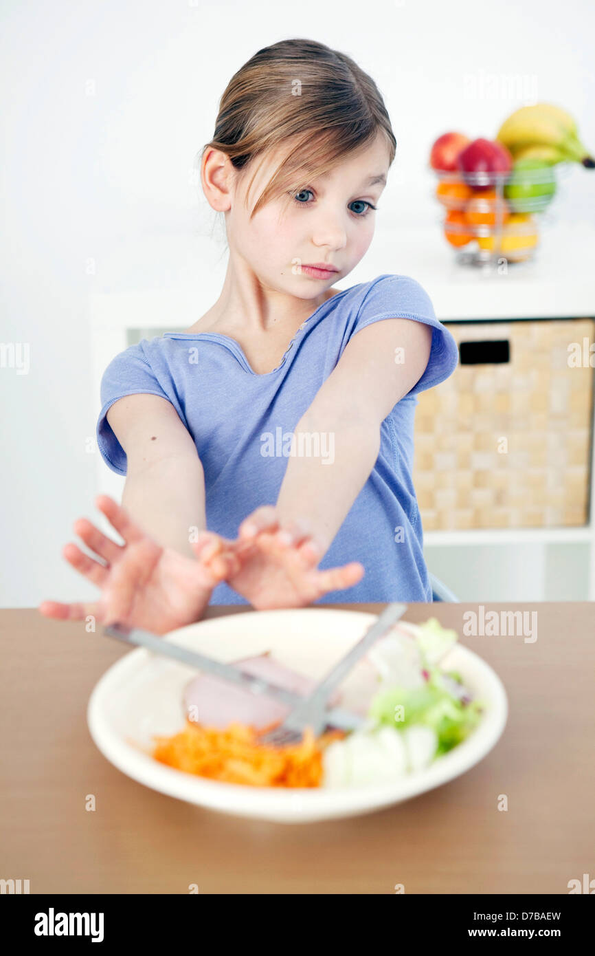 CHILD EATING A MEAL Stock Photo