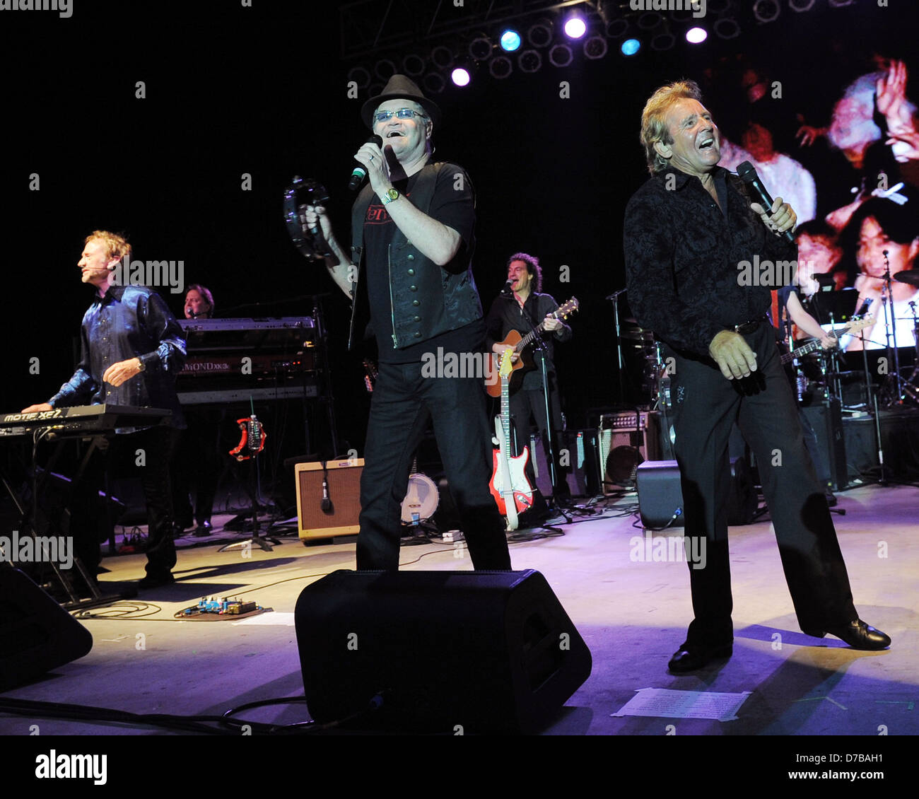 Mickey Dolenz, Davy Jones Peter Tork, Micky Dolenz and Davy Jones of the Monkees perform at the Pompano Beach Amphitheater Stock Photo