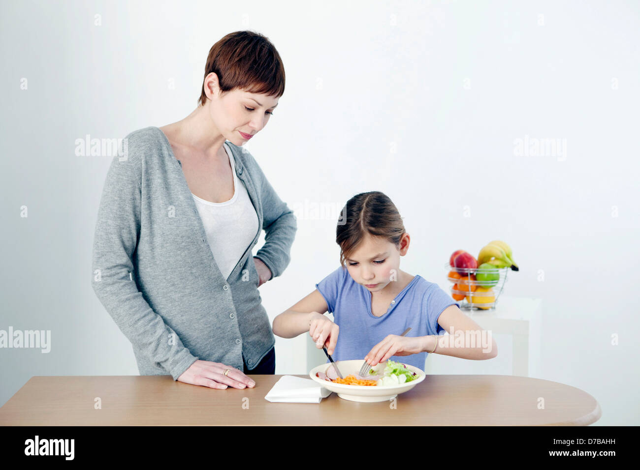 CHILD EATING A MEAL Stock Photo