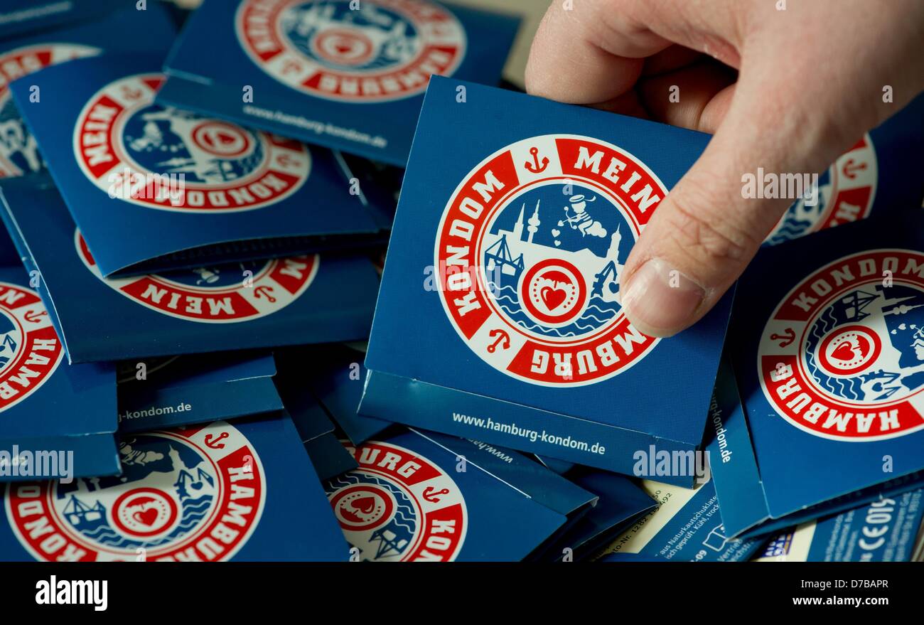 Condoms with a logo and the lettering 'My Hamburg Condom' are presented at a press conference of the German AIDS aid organisation Aids-Hilfe Hamburg e.V. in Hamburg, Germany, 03 May 2013. The condom that was created by Aids-Hilfe Hamburg e.V. shall raise awareness for sexually transmitted diseases and promote prevention. Photo: SVEN HOPPE Stock Photo