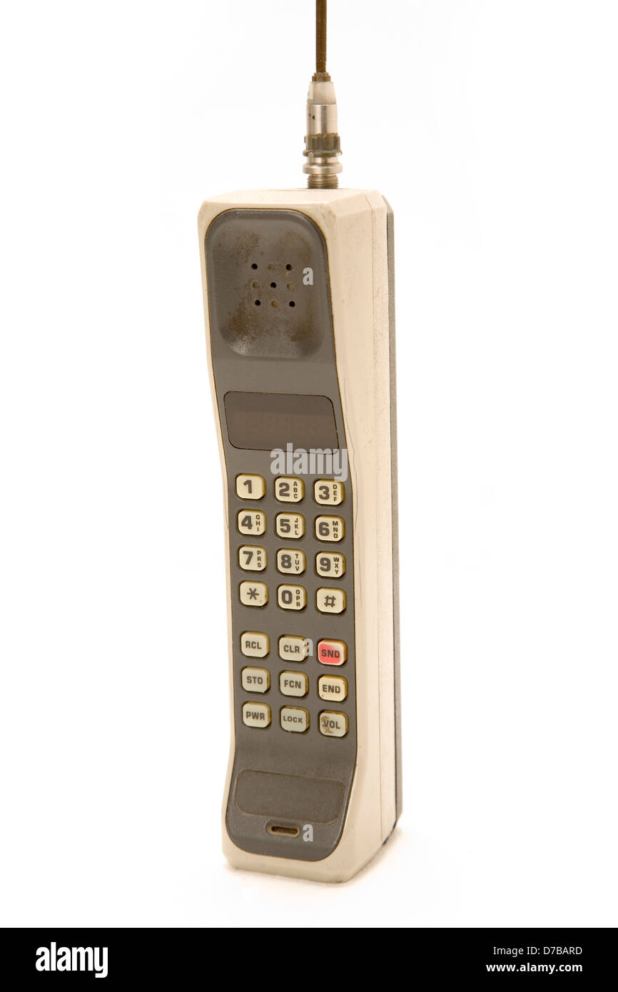 Early 1990's Style Mobile Phone. One of the first models ever made. Isolated on white background. Stock Photo