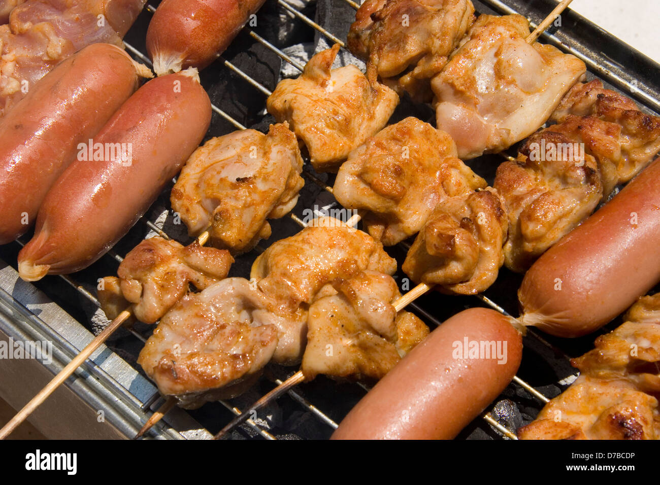 Bar-B-Que (Barbeque) of chicken shashlik and sausages Stock Photo