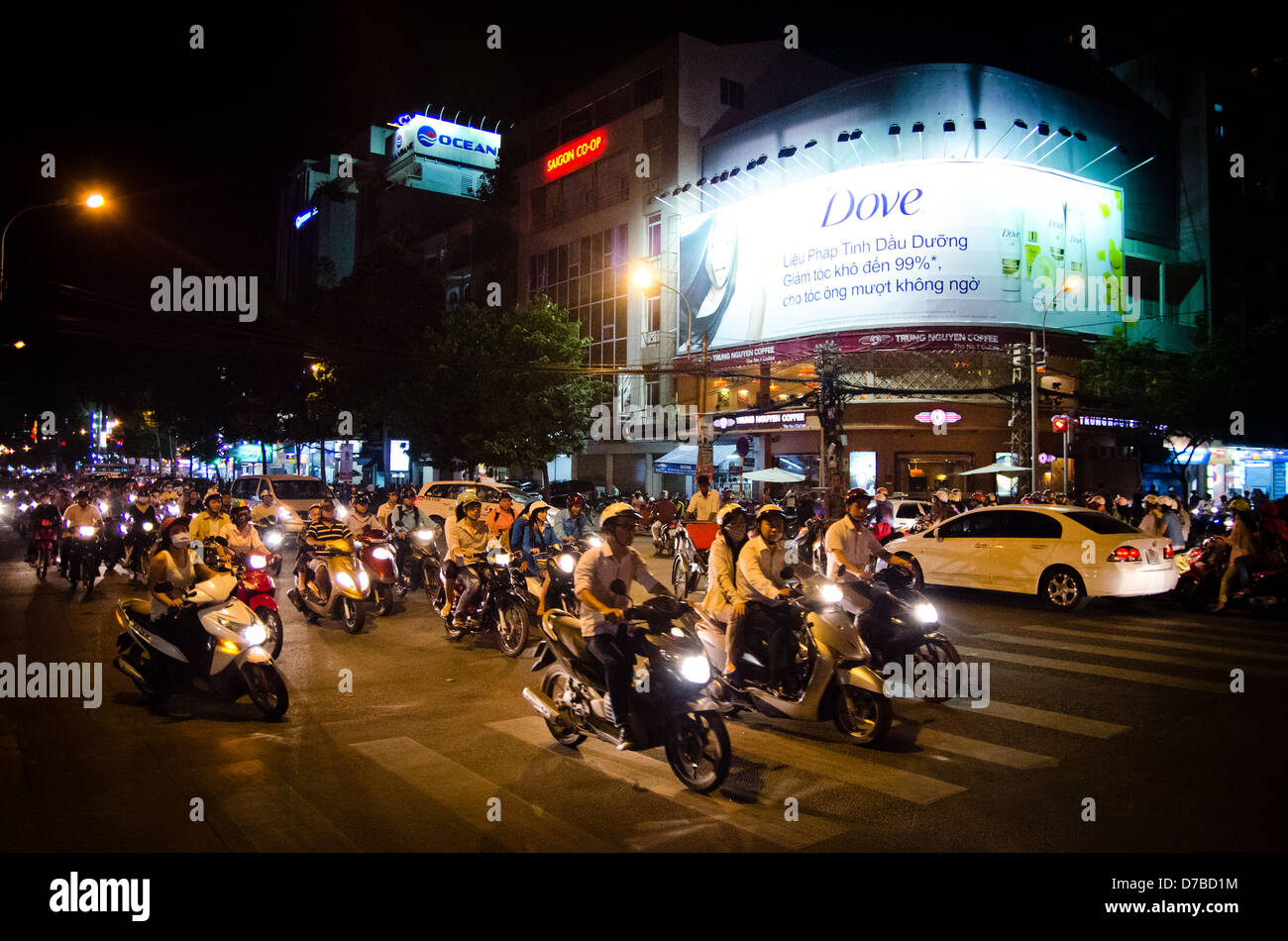 SAIGON, VIETNAM - 26 NOVEMBER: Rush hour in Saigon on 26 November 2012. Motorbikes are the main source of transport in Veitnam. Stock Photo