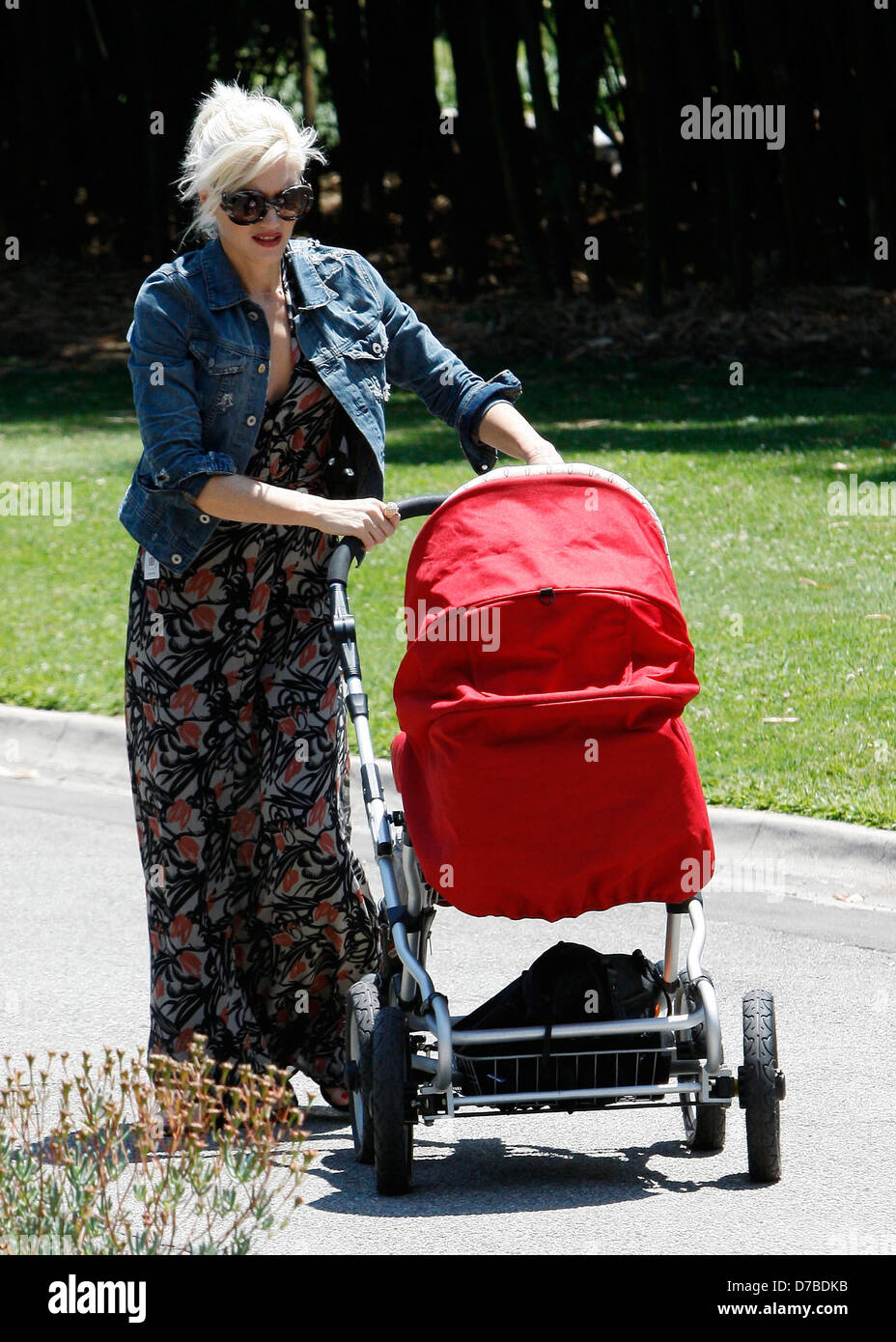 Gwen Stefani pushing her stroller as she takes her sons to The