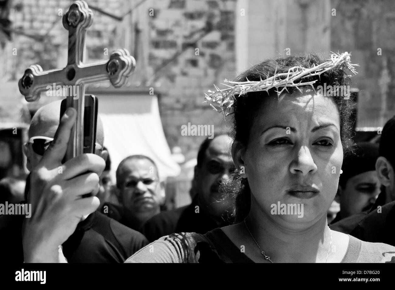 Jerusalem, Israel. 3rd May 2013. Thousands of Eastern Orthodox Christians take part in crucessions along the Via Dolorosa, retracing the last steps of Jesus, on Holy and Great Friday, preceding Easter. Emotions climax on approach to the Church of the Holy Sepulchre. Credit:  Nir Alon / Alamy Live News Stock Photo