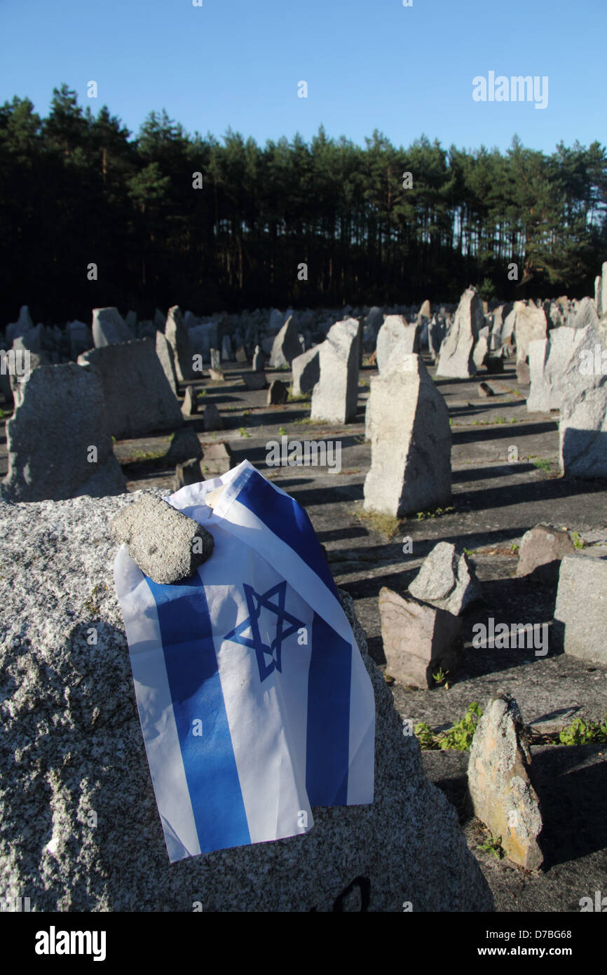 Israeli flag commemorating the Jewish holocaust victims at Treblinka extermination camp in Poland Stock Photo