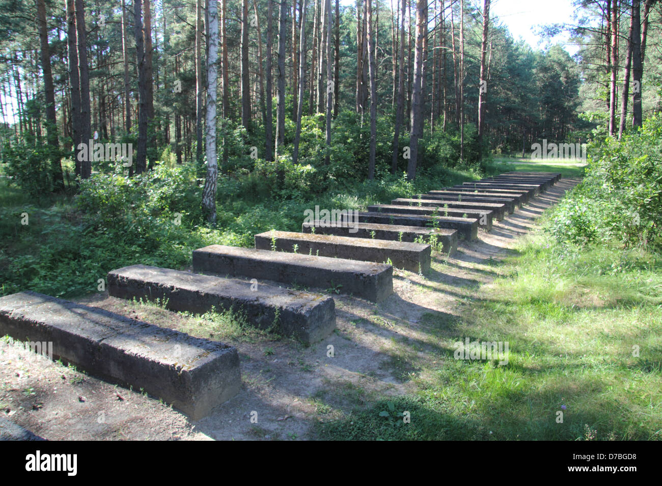 Monument of the railroad tracks that led the holocaust victims into Treblinka extermination camp in Poland Stock Photo