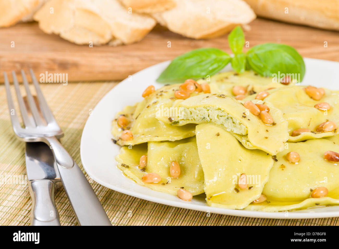 Ravioli Italian egg and spinach pasta with basil, ricotta and pine