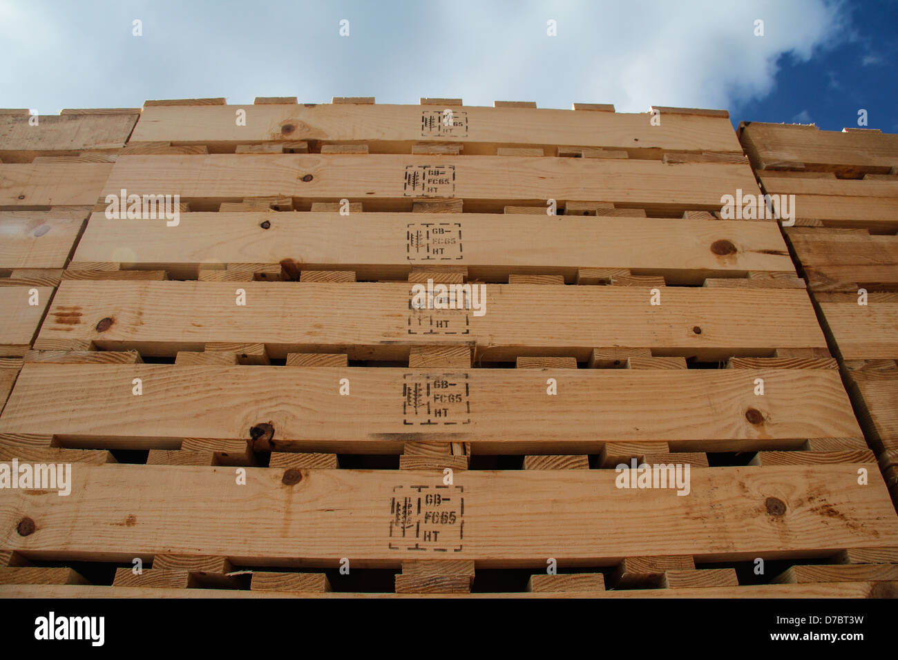 Stack of wooden pallets with heat treated markings Stock Photo