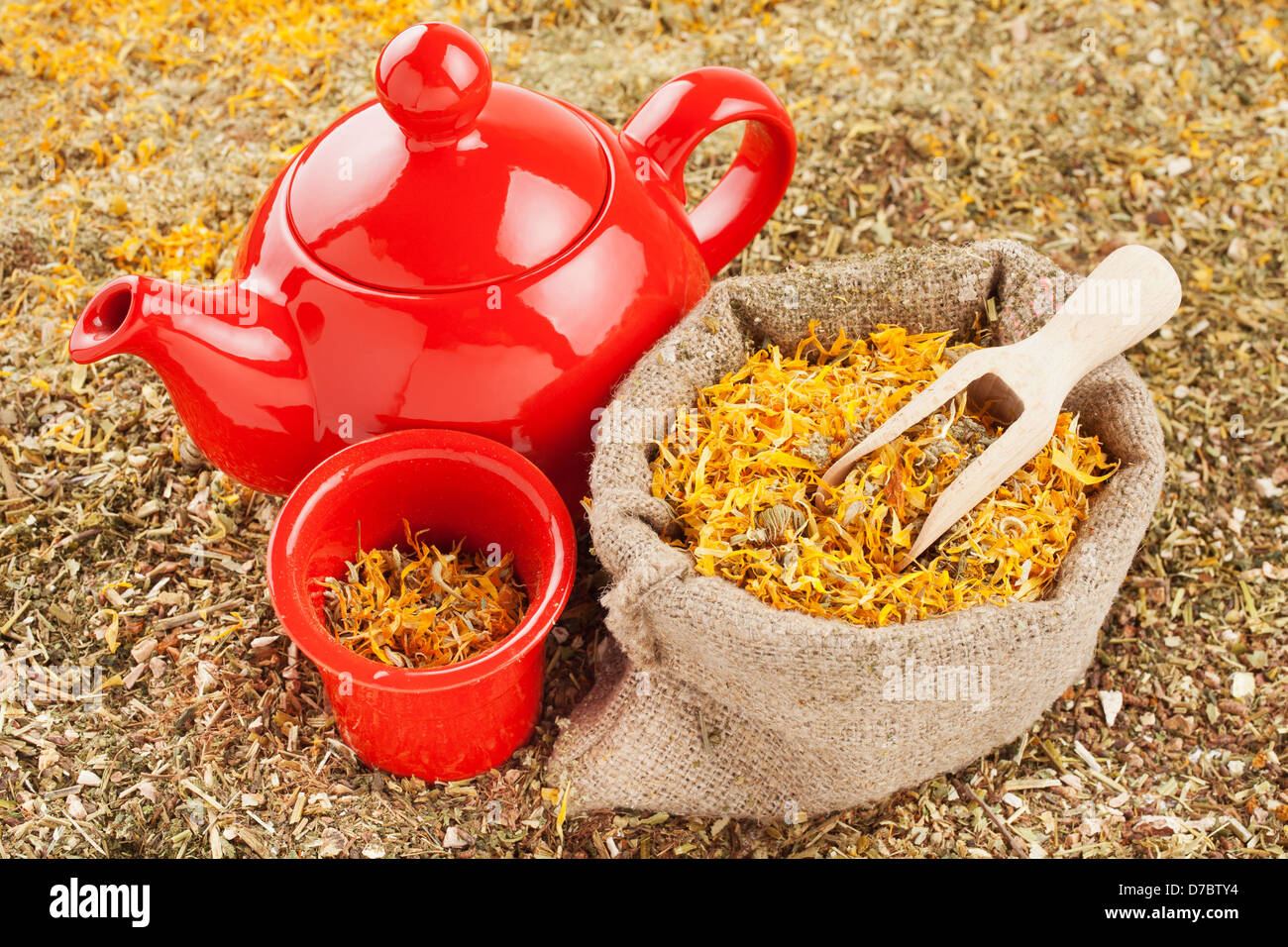 bag with healing herbs and red tea kettle, herbal medicine Stock Photo Alamy
