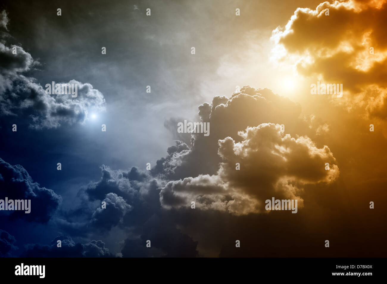 Dramatic background dark sky and bright red light from sun Stock