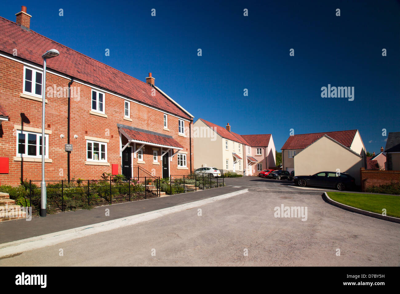 An estate of new build houses in the style and colours of traditional