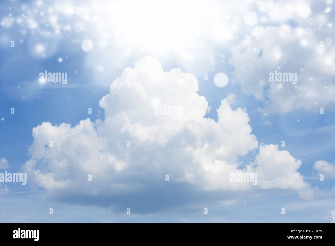 Big white cloud in blue sky, bright light from above Stock Photo - Alamy