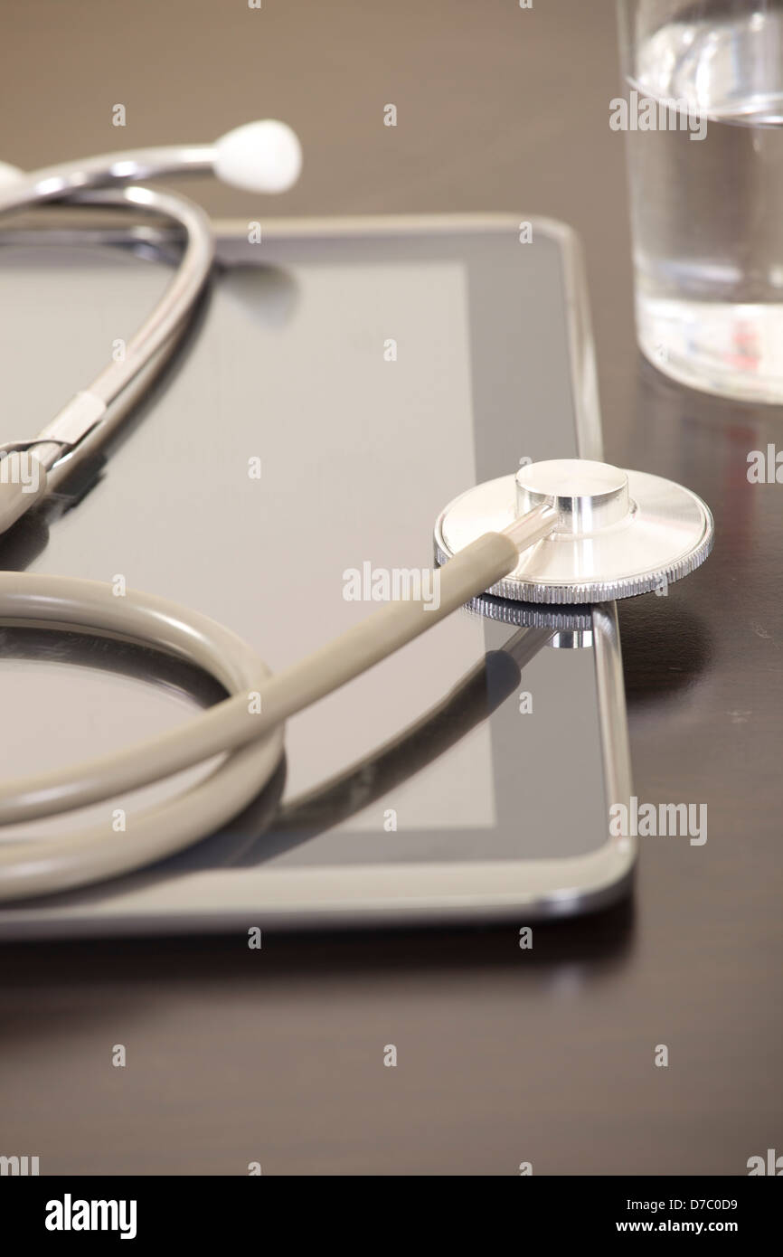 Doctor workplace with digital tablet and stethoscope Stock Photo - Alamy