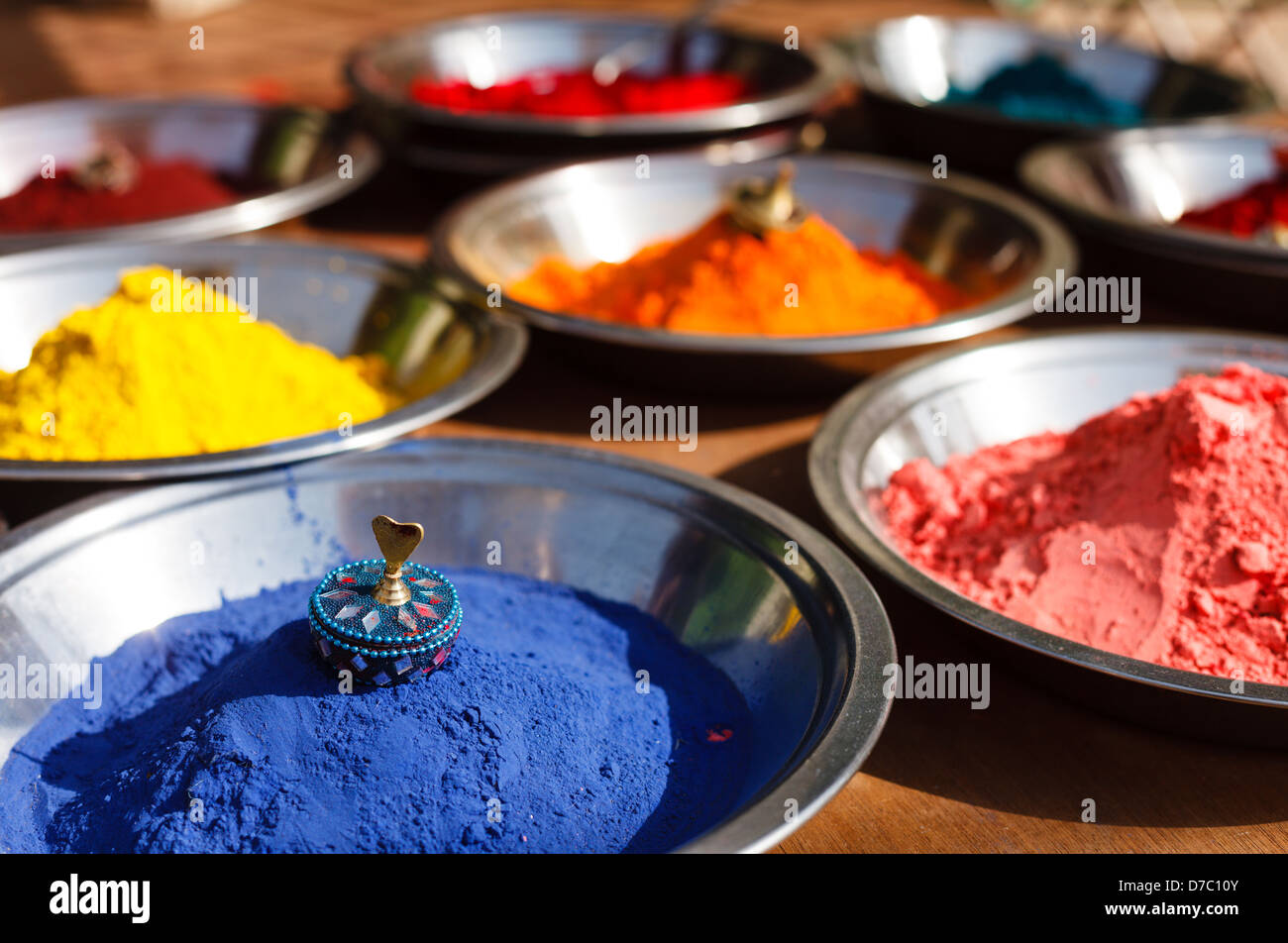 Holi India colored colorful powder kumkum on Indian bazaar for festival celebration Stock Photo
