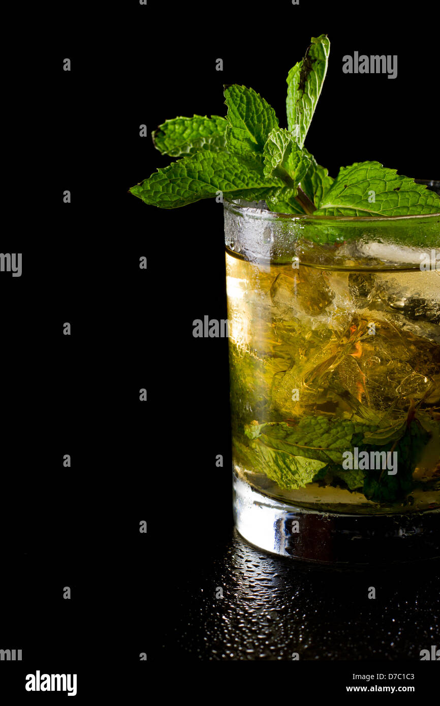 close up of a mint julep served on the rocks and garnished with fresh green mint on top, kentucky derby drink Stock Photo