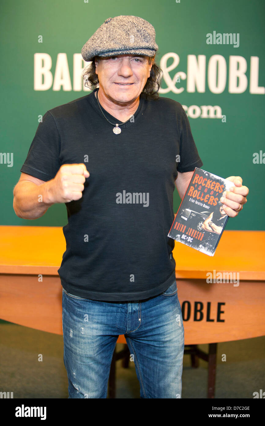 Brian Johnson of the band AC/DC signs his new memoir 'Rockers and