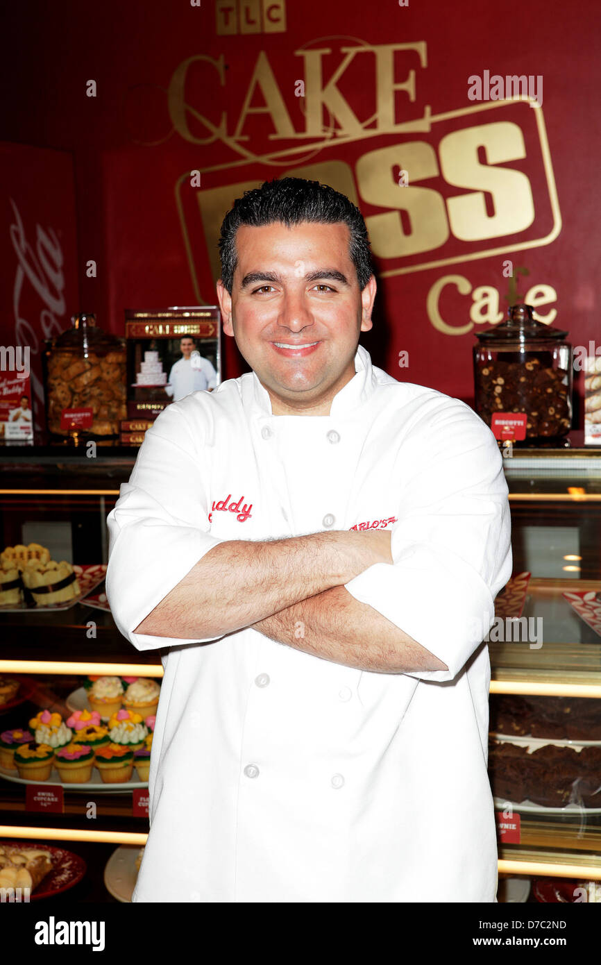 TLC's 'Cake Boss' Buddy Valastro opens the Cake Boss Cafe at Discovery  Times Square in NYC with a ribbon cutting ceremony New Stock Photo - Alamy