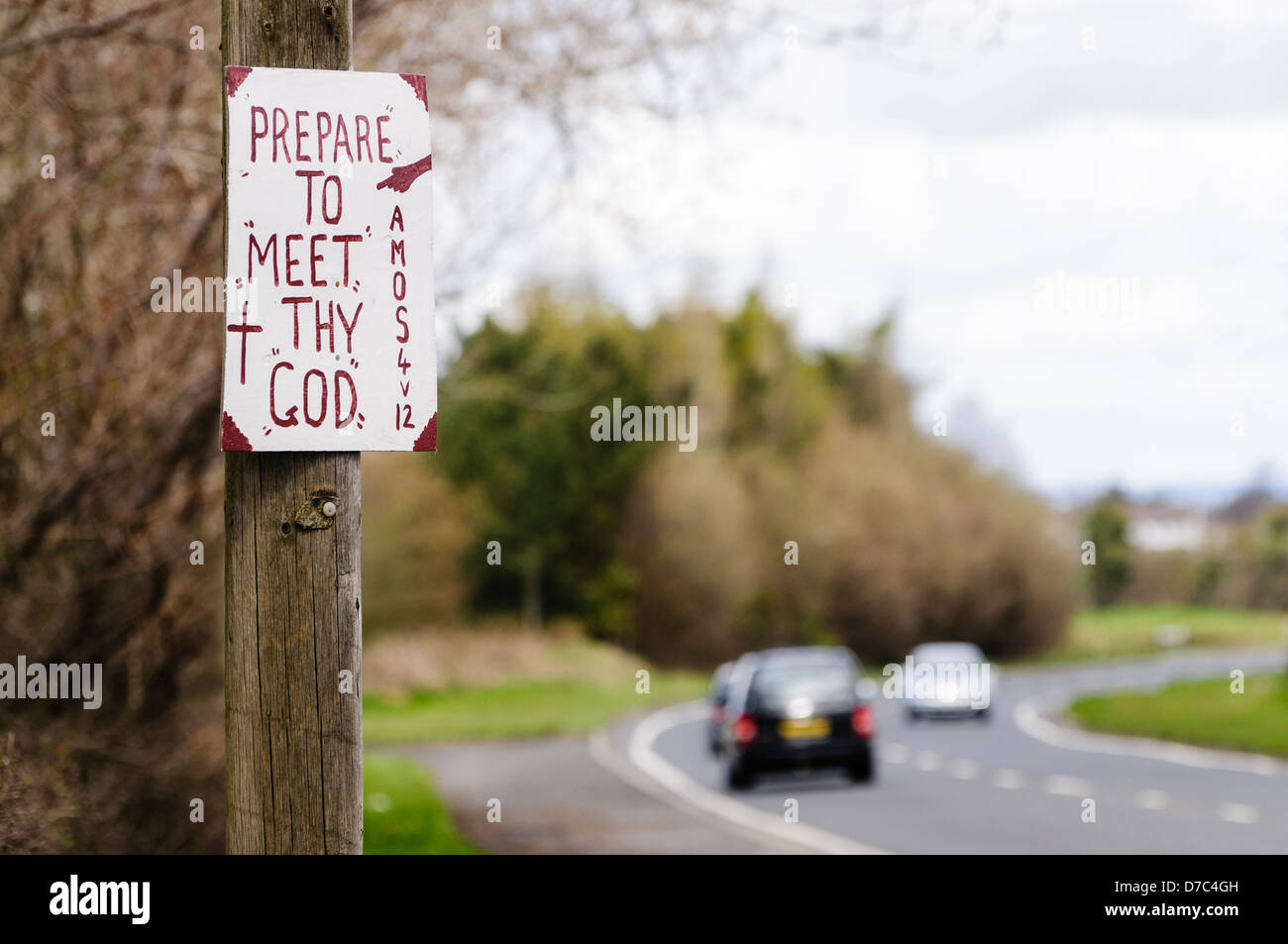 Religious sign typical of many erected in rural Protestant areas of Northern Ireland. 'Prepare to meet thy God'  Amos 4:12 Stock Photo