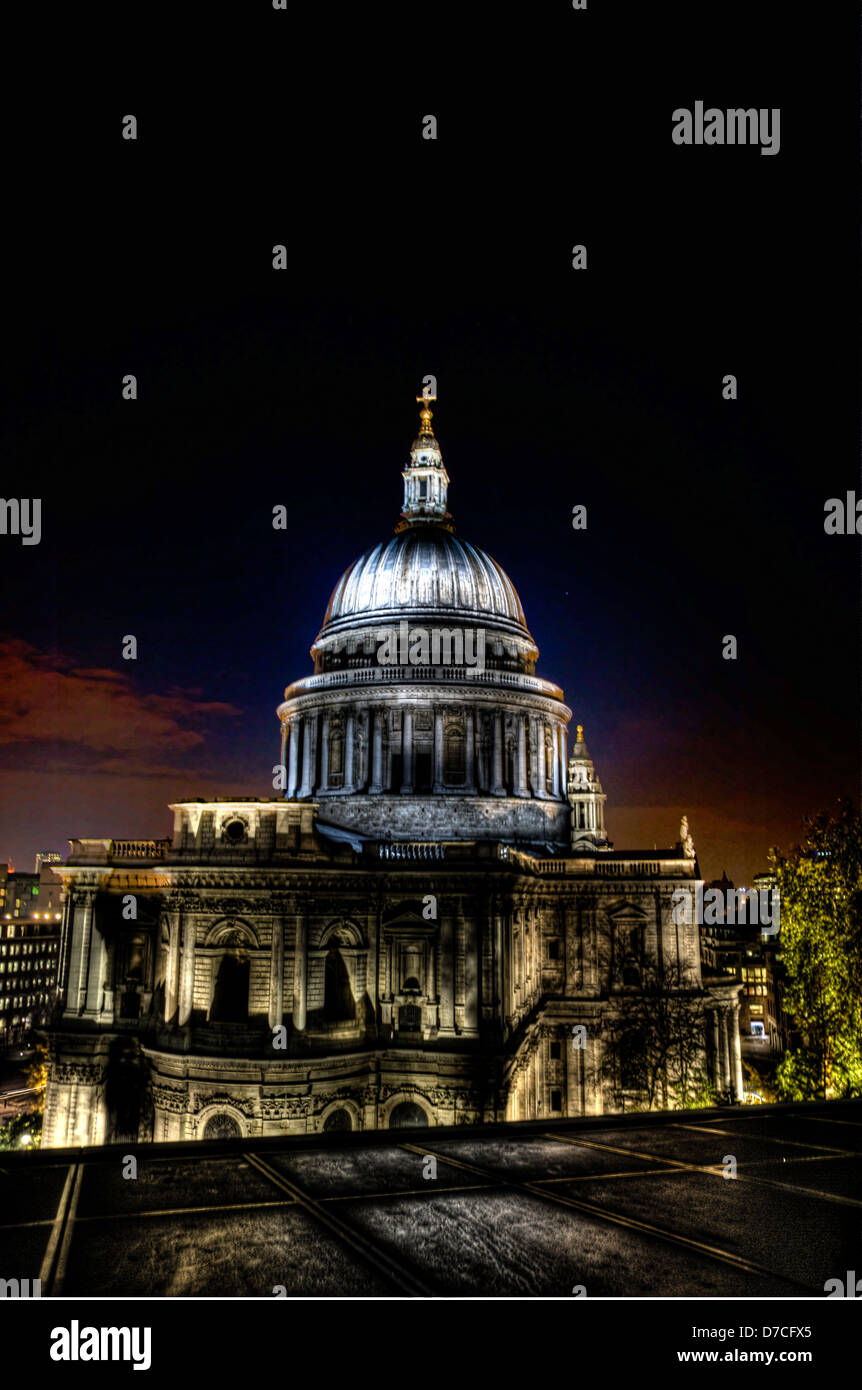 A view of St Paul's Cathedral from the One New Change Shopping center. The Dome is lit up at night so the whole city can see it. Stock Photo