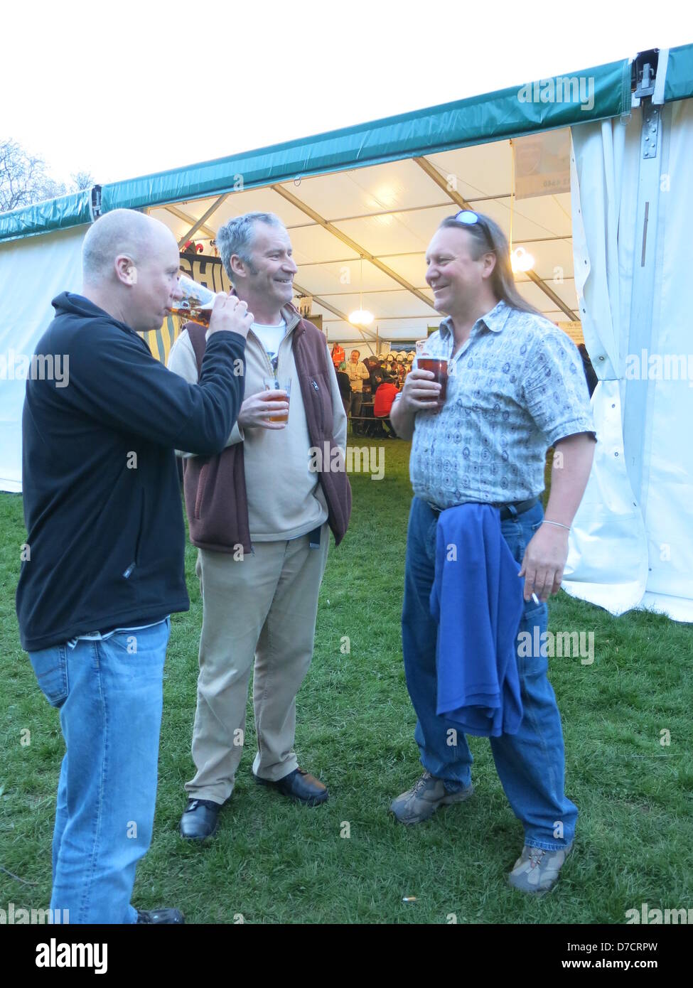 Reading, Berkshire, UK. 3rd May 2013. Celebrating it's 19th year, the Reading Beer & Cider Festival running from Thursday 2nd to Sunday 5th May, welcomes habitual drinkers and new comers alike.    Old friendships are rekindled and new friends made whilst listening to live music, tasting great food and of course sampling some of the 550 real ales, and 150 ciders and perries, on offer. Credit:  Sarah Tubb / Alamy Live News Stock Photo