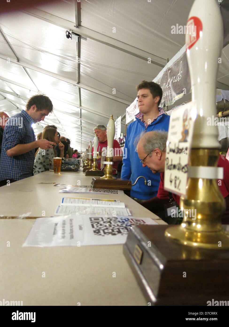 Reading, Berkshire, UK. 3rd May 2013. Celebrating it's 19th year, the Reading Beer & Cider Festival running from Thursday 2nd to Sunday 5th May, welcomes habitual drinkers and new comers alike.    Old friendships are rekindled and new friends made whilst listening to live music, tasting great food and of course sampling some of the 550 real ales, and 150 ciders and perries, on offer. Credit:  Sarah Tubb / Alamy Live News Stock Photo