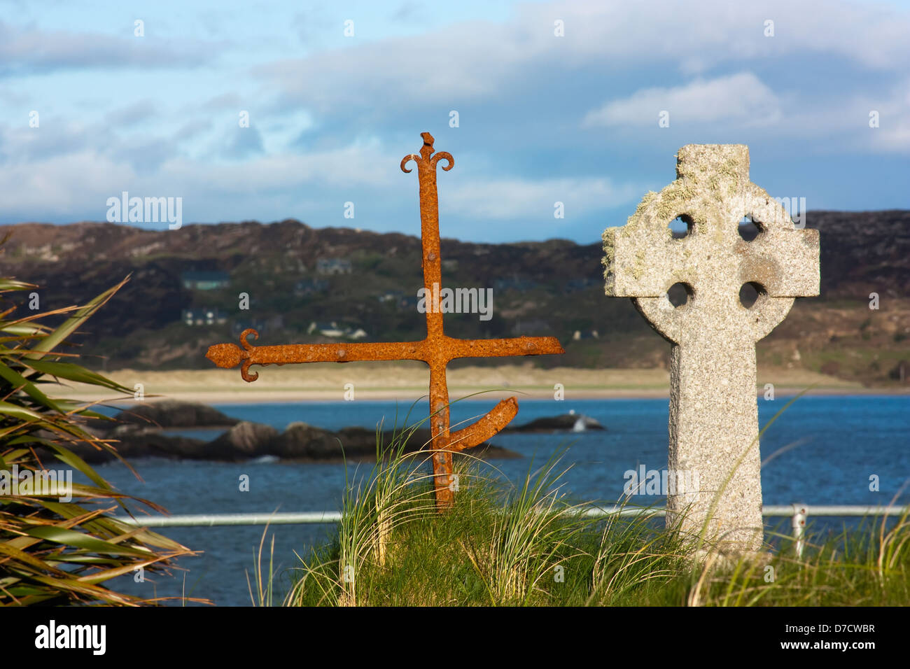 Abbey island graveyard with lambs head in the background;County kerry
