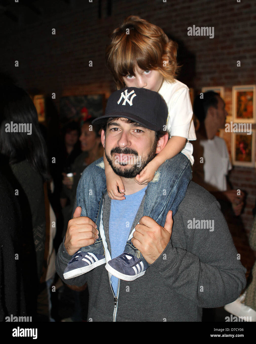 Jordan Bratman and his son Max attend a private party at Cjason's Post