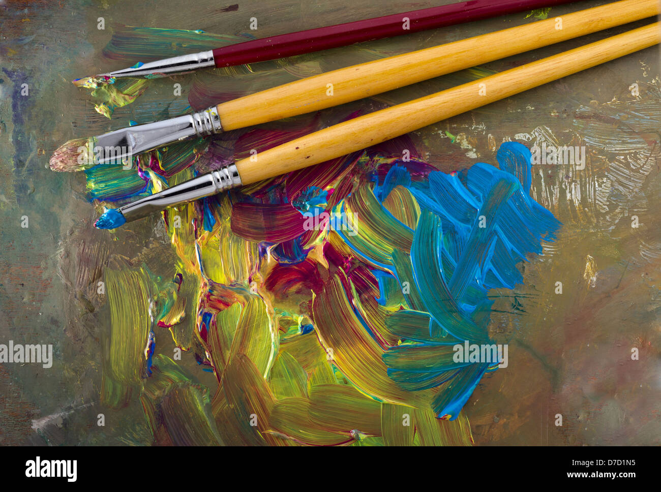 Painter's Palette With Brushes and yellow, magenta and cyan, Stock Photo