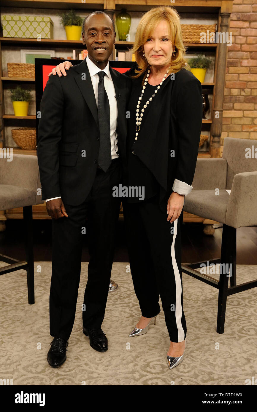 Toronto, Canada. 3rd May 2013. American Actor Don Cheadle poses for photo with host Marilyn Denis after his appearances on The Marilyn Denis Show to promote IRON MAN 3.  (EXI/N8N/Alamy Live News) Stock Photo