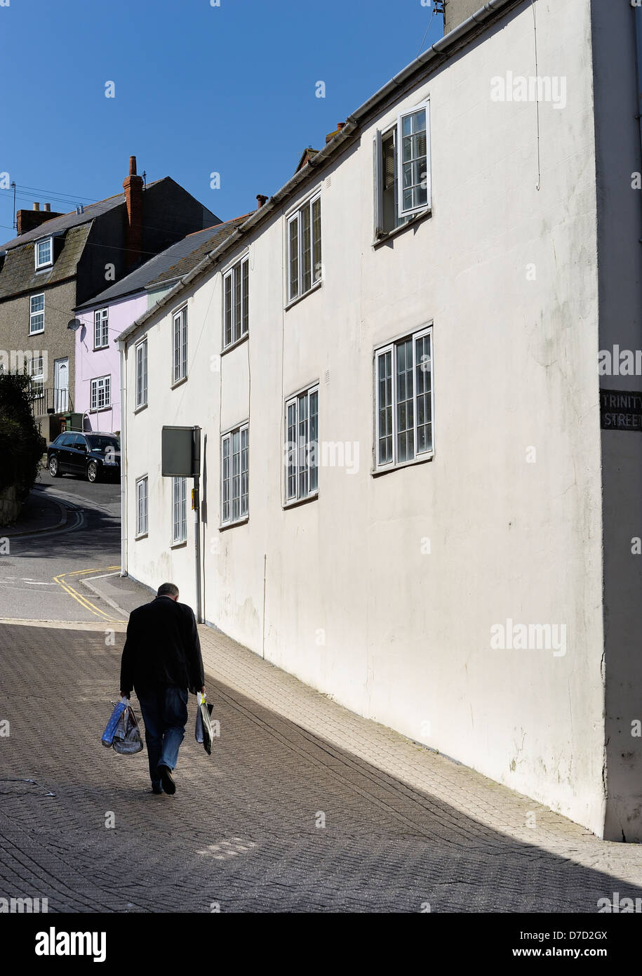 Walking shopping man bags hi-res stock photography and images - Alamy