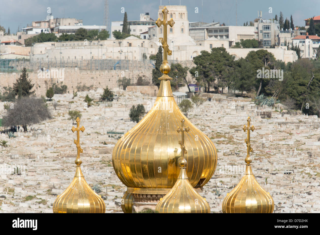 The Golden turrets of the Russian Orthodox Church outside the old city walls in Jerusalem, viewed from the Mount of Olives Stock Photo