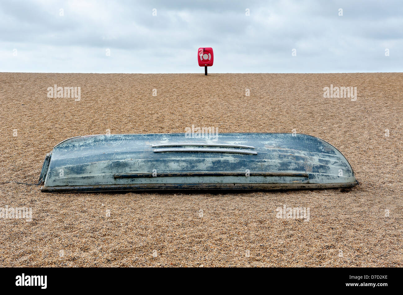 A boat upside down on a beach Stock Photo Alamy